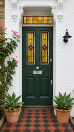 Decorative privacy window film with an Art Deco stained glass pattern installed on a front door with matching transom.