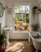 Contemporary geometric stained glass window film allowing natural light through while enhancing privacy in a modern home.